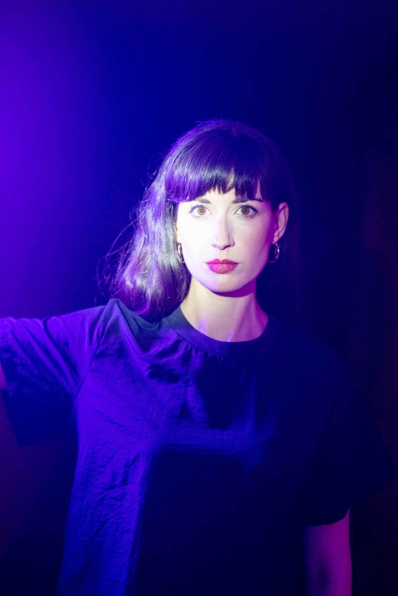 Maya Shenfeld in violet light